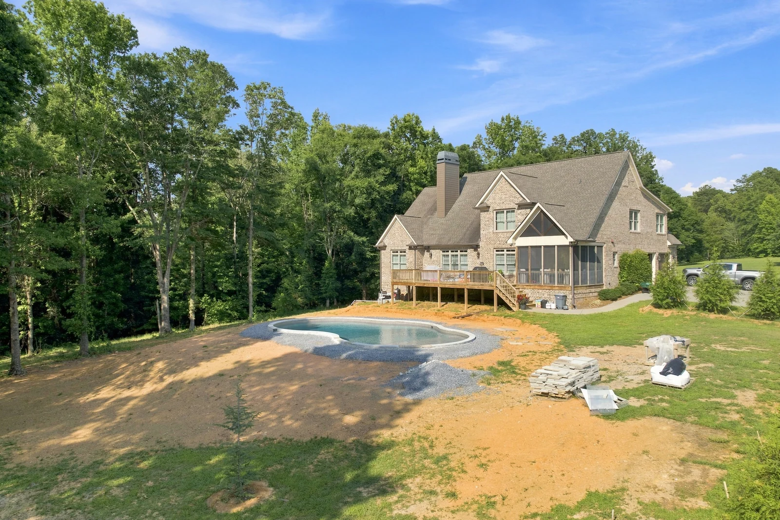 Barker Road in Rome, GA, before BDS started: a new pool sitting in bare clay behind the house
